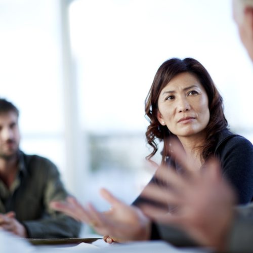 Business people talking in meeting